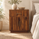 Lina Solid Wood Curved Ribbed Bedside with Drawer — Amber Oak — styled interior